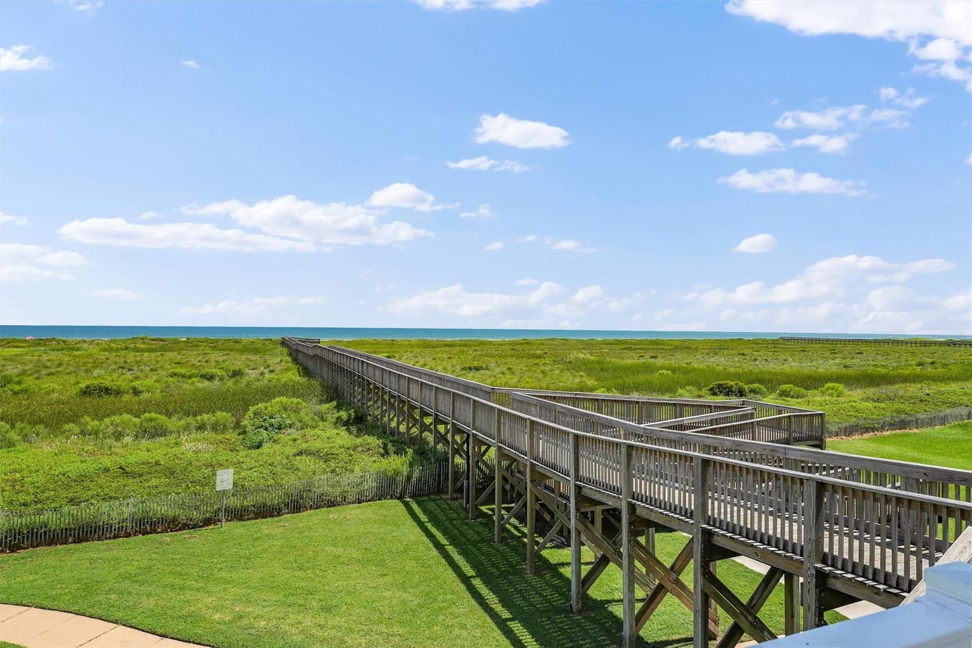 Boardwalk across the coastal wetlands near Pointe West, Galveston