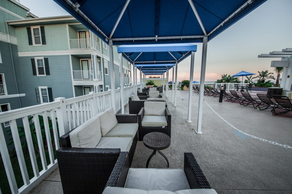 Covered poolside cabana lounge