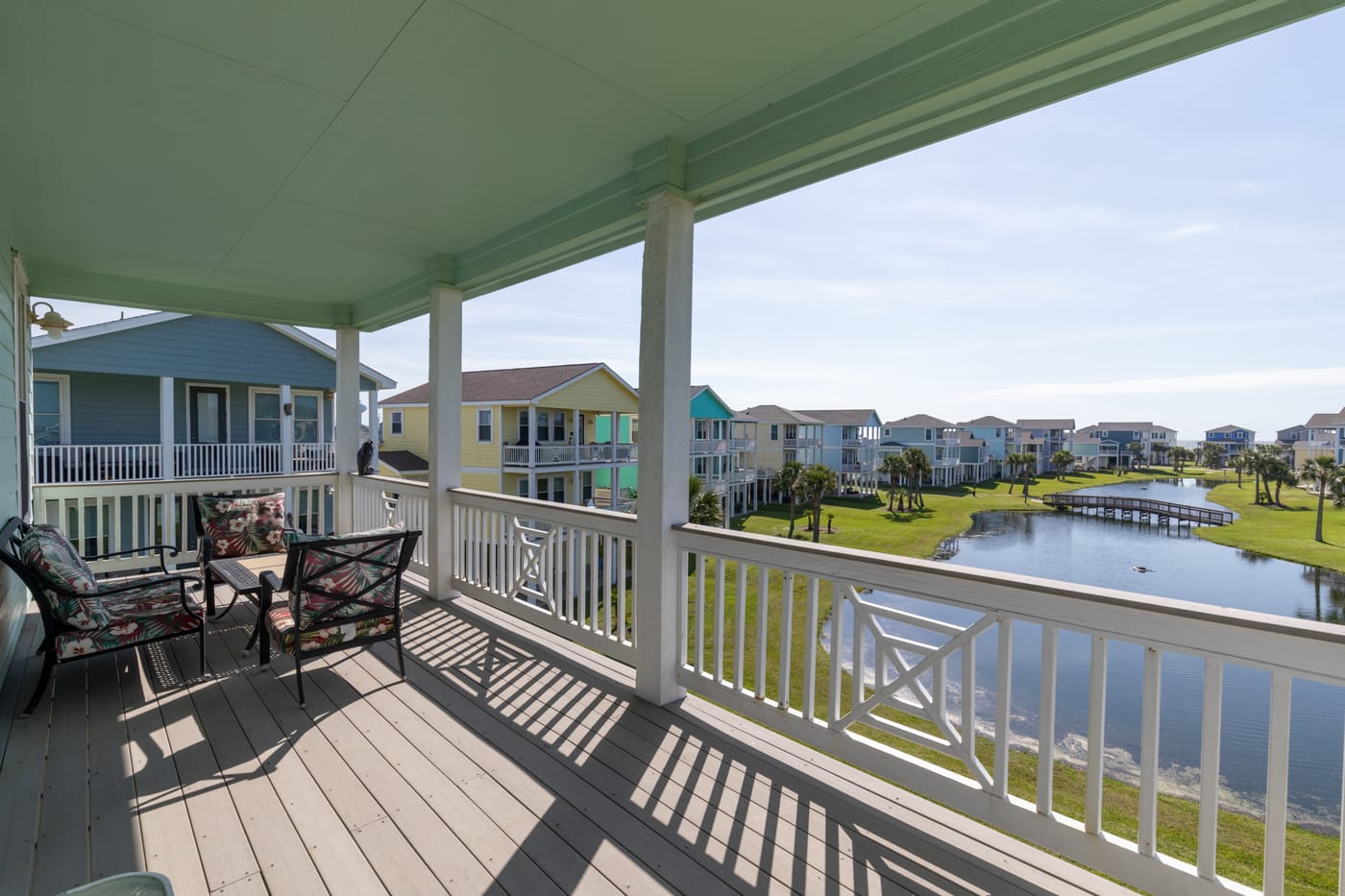 Private balcony with seating and sweeping resort views