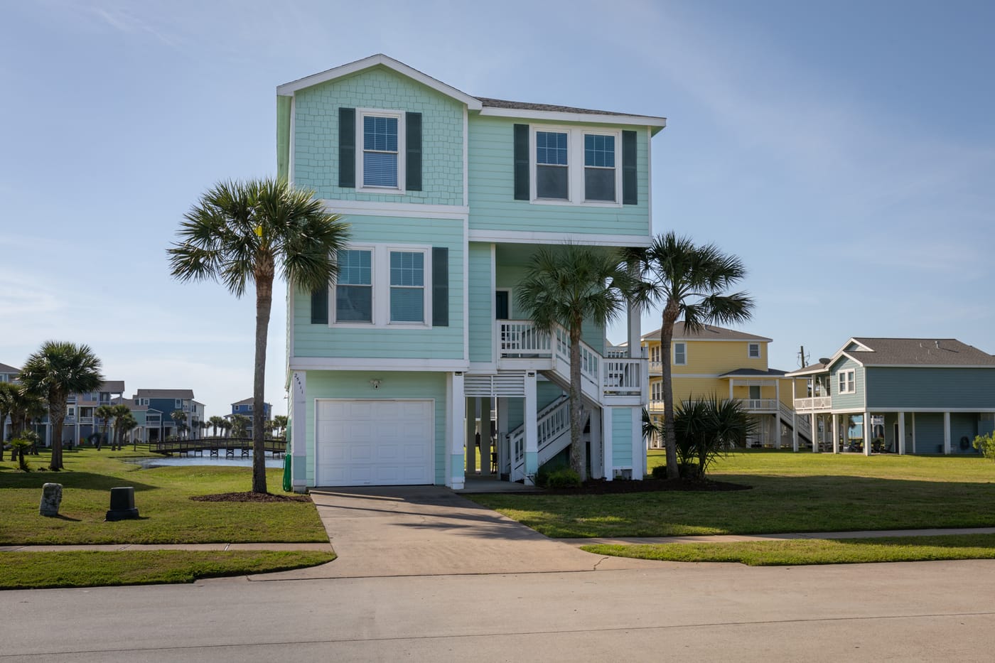 Sunset Kisses two-story beachside home at Pointe West, Galveston